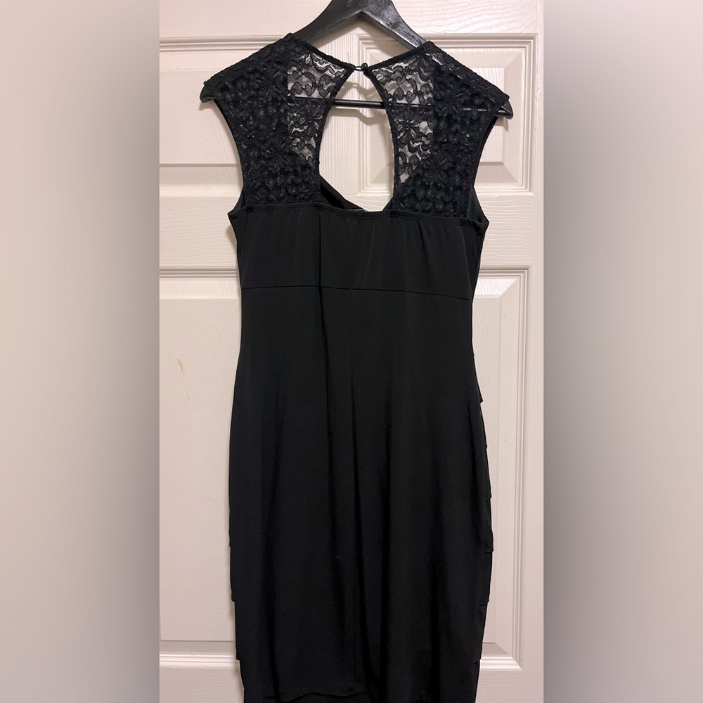 Black fitted dress.